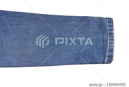 Close-up of blue denim fabric texture in a jeans sleeve with detailed stitching 130405095