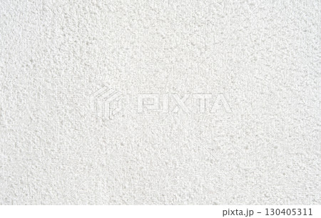 Close-up of textured white carpet surface with detailed fabric weave pattern Close-up of textured white carpet surface with detailed fabric weave pattern 130405311