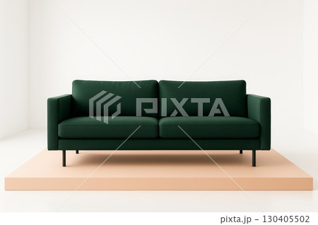 Green modern sofa on peach platform with white background, minimalist furniture design. 130405502