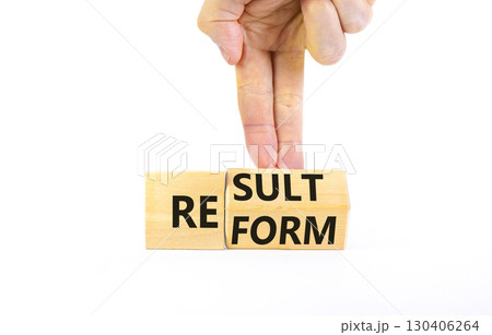 Reform and result symbol. Concept words Reform Result on beautiful wooden block. Beautiful white table white background. Businessman hand. Business Reform and result concept. Copy space. Reform and result symbol. Concept words Reform Result on beautiful wooden block. Beautiful white table white background. Businessman hand. Business Reform and result concept. Copy space. 130406264