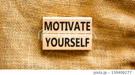 Motivate yourself symbol. Concept words Motivate yourself on beautiful wooden blocks. Beautiful canvas table canvas background. Business psychology motivate yourself concept. Copy space. Motivate yourself symbol. Concept words Motivate yourself on beautiful wooden blocks. Beautiful canvas table canvas background. Business psychology motivate yourself concept. Copy space. 130406277