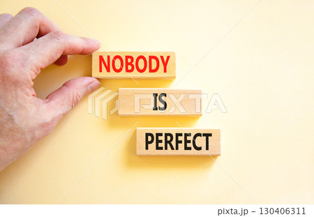Nobody is perfect symbol. Concept words Nobody is perfect on beautiful wooden block. Beautiful white background. Business motivational lifestyle and nobody is perfect concept. Copy space. Nobody is perfect symbol. Concept words Nobody is perfect on beautiful wooden block. Beautiful white background. Business motivational lifestyle and nobody is perfect concept. Copy space. 130406311