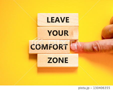 Leave your comfort zone symbol. Concept words Leave your comfort zone on beautiful wooden blocks. Beautiful yellow paper background. Business psychological Leave your comfort zone concept. Copy space. Leave your comfort zone symbol. Concept words Leave your comfort zone on beautiful wooden blocks. Beautiful yellow paper background. Business psychological Leave your comfort zone concept. Copy space. 130406355