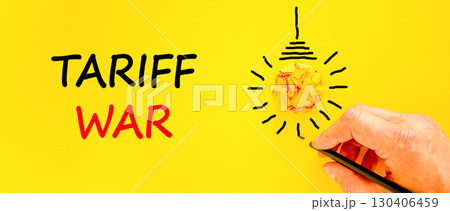 Trade tariff war symbol. Concept word Tariff war on beautiful yellow paper. Businessman's hand. Light bulb icon. Beautiful yellow paper background. Business trade tariff wars concept. Copy space. Trade tariff war symbol. Concept word Tariff war on beautiful yellow paper. Businessman's hand. Light bulb icon. Beautiful yellow paper background. Business trade tariff wars concept. Copy space. 130406459