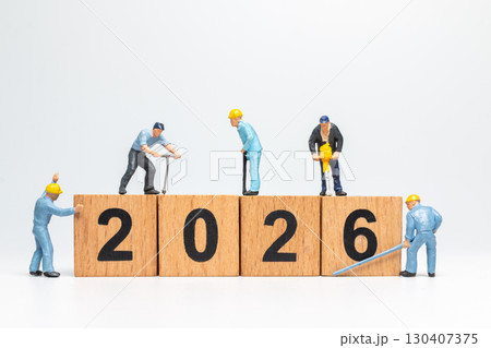 Miniature Construction Workers Building 2026 Wooden Number Blocks 130407375