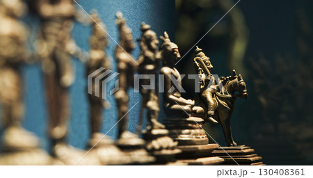 Row Of Old Ancient Bronze Figurines Of Indian Deities And Avatars. 18-19th Century Ce. Close-up View On Vamana Avatara 130408361