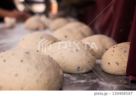 bread preparation. loaves of dough before baking bread preparation. loaves of dough before baking 130408587