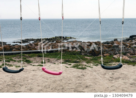 Swing on the beach by the sea. Swing on the beach by the sea. 130409479