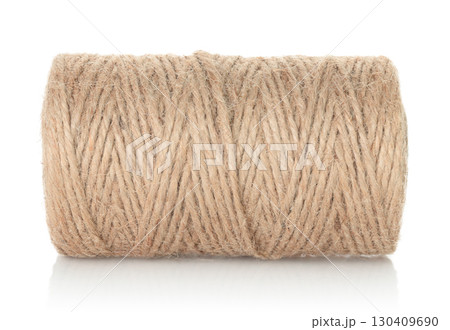 Jute burlap twine spool isolated on transparent background. Natural fiber for eco and zero waste packaging, craft and DIY, gardening, rustic decor and branding mockup. Full focus photo 130409690