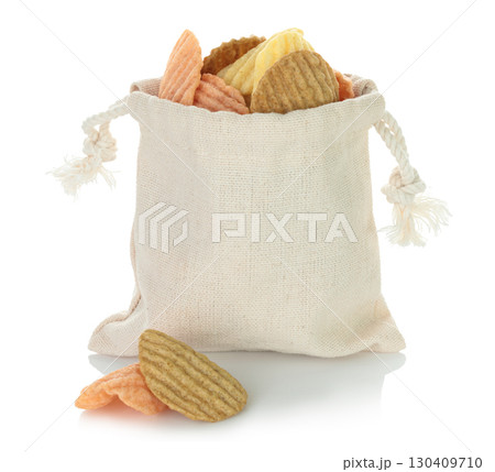 Open cotton fabric bag filled with assorted vegetable chips isolated on transparent background. Eco friendly zero waste packaging for healthy vegan and organic snack food. Full focus photo Open cotton fabric bag filled with assorted vegetable chips isolated on transparent background. Eco friendly zero waste packaging for healthy vegan and organic snack food. Full focus photo 130409710