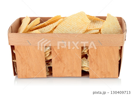 Wooden plywood tray filled with potato chips isolated on transparent background. Eco friendly natural packaging for snack food, fast food and junk food, and mockup template. Full focus photo 130409713
