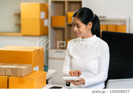 Entrepreneur working at home. Online shopping, e-commerce, internet banking, spending money, working from home concept. 130409857