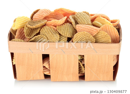 Assorted vegetable chips in thin plywood wooden tray for fruits, isolated on transparent background, full focus stacking with sharp detail and texture Assorted vegetable chips in thin plywood wooden tray for fruits, isolated on transparent background, full focus stacking with sharp detail and texture 130409877