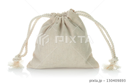 Closed cotton pouch tied with drawstrings, isolated on transparent background, full focus stacking for sharp texture and clear detail 130409893