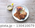 grilled spicy chicken steak with salad dipping mayonnaise sauce on plate   130410079