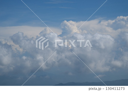High nature view large white clouds on soft sky background in the morning, View of white cloudy on the plane. 130411273