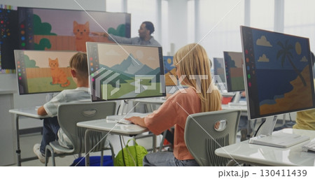 Primary School Students Drawing Pictures on Computers. Teacher Educating Kids Using Digital Screen 130411439