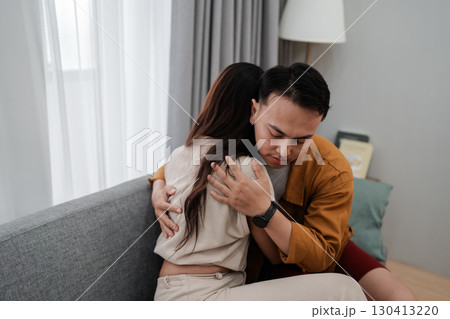 Emotional Embrace A Heartfelt Moment of Comfort and Support Between Partners 130413220