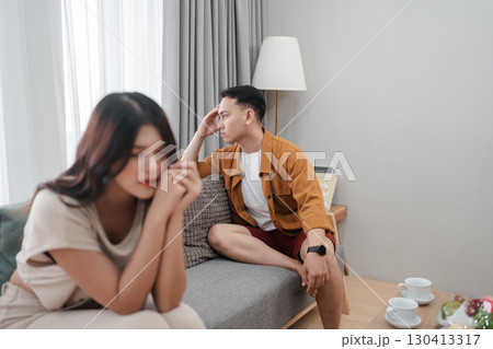 Exploring the Emotional Tension Experienced by a Couple in a Modern Living Room Setting Exploring the Emotional Tension Experienced by a Couple in a Modern Living Room Setting 130413317