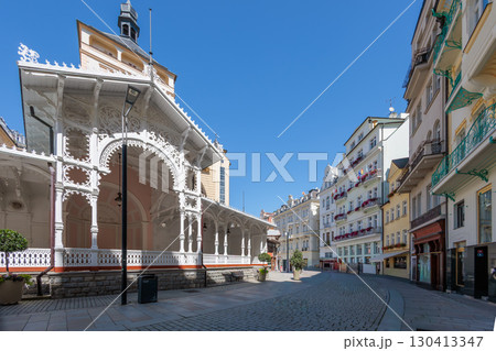 Summer walk through the spa center of the famous Karlovy Vary (Carlsbad) in the Czech Republic 130413347