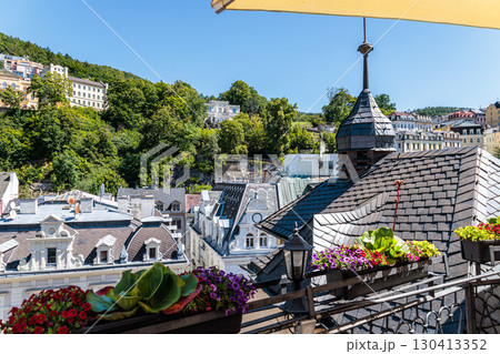 Summer walk through the spa center of the famous Karlovy Vary (Carlsbad) in the Czech Republic 130413352