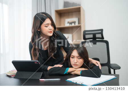 Supportive colleagues foster a positive office environment, enhancing career growth Supportive colleagues foster a positive office environment, enhancing career growth 130413410