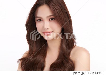 A beautiful young Asian woman with clean, fresh skin against a white background. Skincare, facial treatment, cosmetology, beauty, and spa. An elegant portrait of an Asian woman. A beautiful young Asian woman with clean, fresh skin against a white background. Skincare, facial treatment, cosmetology, beauty, and spa. An elegant portrait of an Asian woman. 130414955