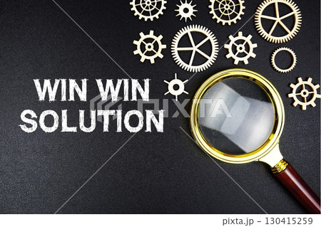 Win Win Solution text message with magnifying glass on black background Win Win Solution text message with magnifying glass on black background 130415259