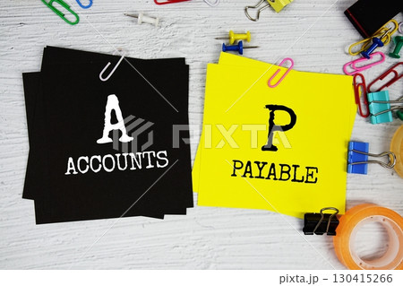 AP - Accounts Payable text on stick note with stationery on concrete background 130415266