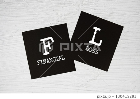 FL - Financial Loss text on stick note on concrete background FL - Financial Loss text on stick note on concrete background 130415293