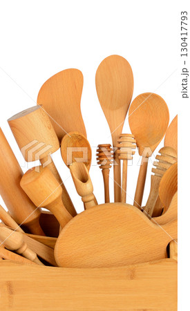 Assortment of Wooden Kitchen Utensils isolated on white. Vertical photo. Assortment of Wooden Kitchen Utensils isolated on white. Vertical photo. 130417793
