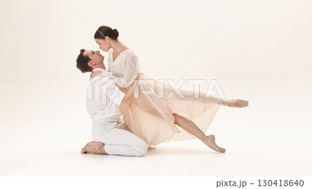 Ballet couple in romantic floor pose showing intimacy and trust 130418640