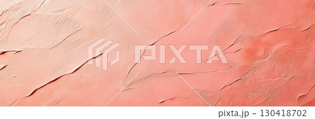 Gradient textured background of decorative plaster wall is painted in trendy coral pink color, creating a beautiful backdrop with brush strokes and textured details Gradient textured background of decorative plaster wall is painted in trendy coral pink color, creating a beautiful backdrop with brush strokes and textured details 130418702