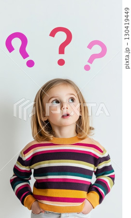 Portrait of a pensive little girl with colorful question marks above her head, symbolizing curiosity, childhood questions, and the quest for knowledge in a playful and engaging way 130419449