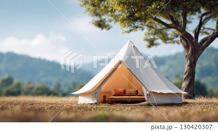 Luxurious glamping tent nestled beneath woodland canopy, overlooking majestic mountain landscape, providing serene outdoor retreat for summer adventurers Luxurious glamping tent nestled beneath woodland canopy, overlooking majestic mountain landscape, providing serene outdoor retreat for summer adventurers 130420307