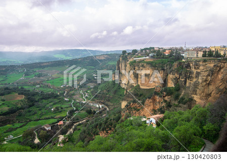 Title: Panoramic View of Ronda Spain and the Surrounding Green Landscape. 130420803