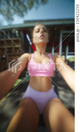Participating in a Consistent Active Fitness Routine While Enjoying an Inviting Outdoor Gym Setting Participating in a Consistent Active Fitness Routine While Enjoying an Inviting Outdoor Gym Setting 130421259