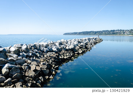 Breakwater rocks at White Rock Pier and the semiahmoo bay inland waters, Surrey, BC, Canada Breakwater rocks at White Rock Pier and the semiahmoo bay inland waters, Surrey, BC, Canada 130421929