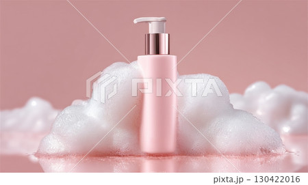 Pink soap dispenser amid foamy bubbles on a pastel background, beauty concept 130422016