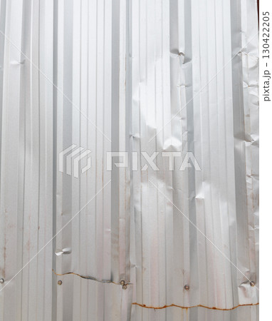 Wrinkled corrugated sheet background texture Wrinkled corrugated sheet background texture 130422205
