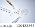 Three test tubes with spilled serums. Demonstration of textures. 130422268