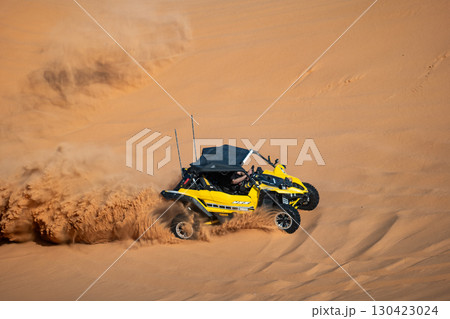 Off-road buggy in the desert, Saudi Arabia 130423024