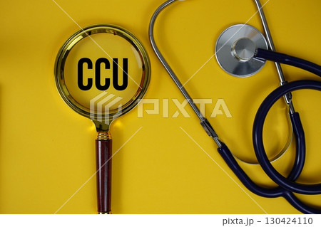 CCU abbreviation of Coronary Care Unit text with Stethoscope and magnifying glass flat lay on yellow background CCU abbreviation of Coronary Care Unit text with Stethoscope and magnifying glass flat lay on yellow background 130424110