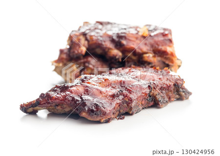 Pork BBQ glazed ribs isolated on white background. Pork BBQ glazed ribs isolated on white background. 130424956