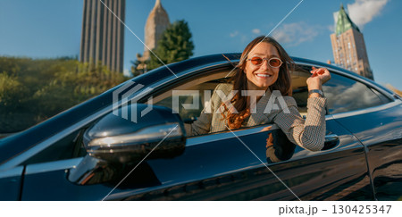 Embarking on a joyful and thrilling road trip adventure in an exciting urban setting Embarking on a joyful and thrilling road trip adventure in an exciting urban setting 130425347