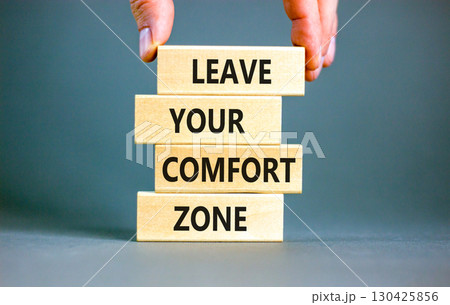 Leave your comfort zone symbol. Concept words Leave your comfort zone on beautiful wooden blocks. Beautiful grey paper background. Business psychological Leave your comfort zone concept. Copy space. Leave your comfort zone symbol. Concept words Leave your comfort zone on beautiful wooden blocks. Beautiful grey paper background. Business psychological Leave your comfort zone concept. Copy space. 130425856