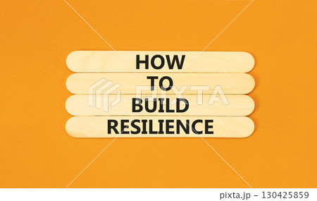 How to build resilience symbol. Concept words How to build resilience on beautiful wooden sticks. Beautiful orange table orange background. Business and how to build resilience concept. Copy space. How to build resilience symbol. Concept words How to build resilience on beautiful wooden sticks. Beautiful orange table orange background. Business and how to build resilience concept. Copy space. 130425859