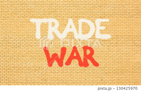Trade war symbol. Concept word Trade war on beautiful brown brick wall. Beautiful brown brick wall background. Brick wall. Business trade war concept. Copy space. 130425970