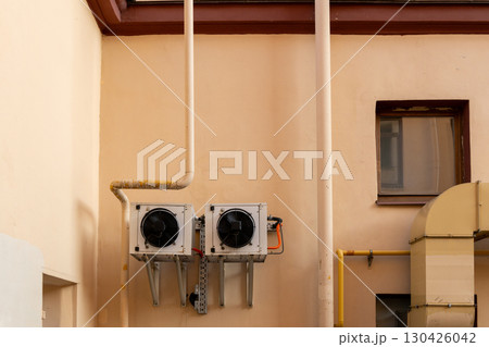 air conditioners are mounted on the wall. technologies for air cooling in hot weather. air conditioners are mounted on the wall. technologies for air cooling in hot weather. 130426042