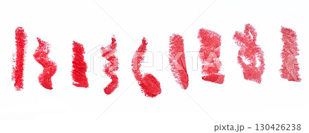 Strokes made with red lipstick. The strokes have uneven texture and jagged edges, isolated background 130426238
